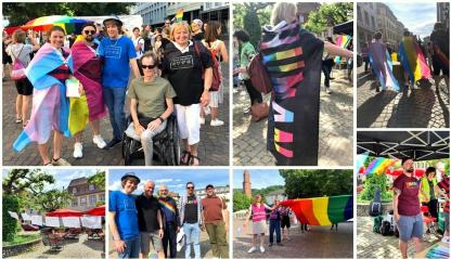 Collage zum Aktionstag IDAHOBALTI* in Heidelberg: Es sind verschiedene Teile der Aktion des queeren Netzwerks auf dem Karlsplatz zu sehen: Menschen tragen verschiedene Pride-Flaggen; es wurden Plakate geschrieben und Infostände präsentiert.